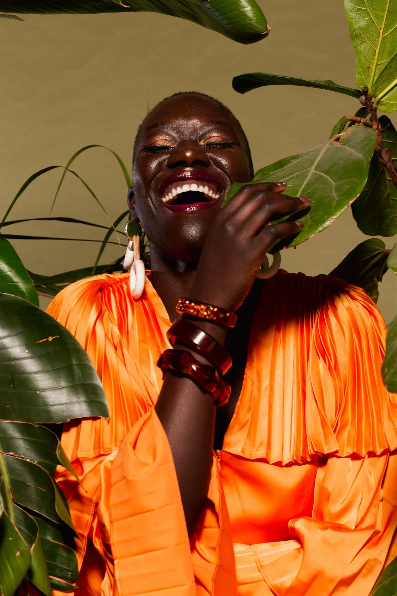 Figaero_Zhuri_Laughing black woman around plants.jpg