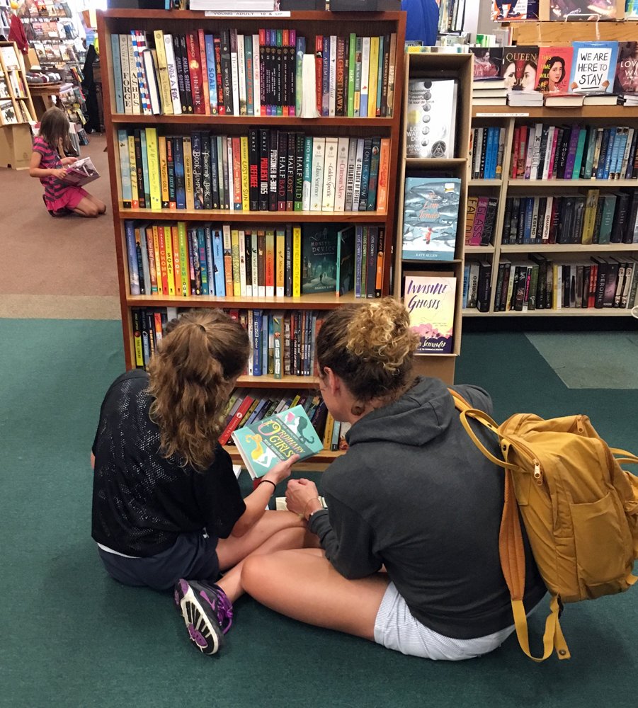 Northwind-Book-and-Fiber-mom-and-daughter-in-front-of-bookshelf.jpg