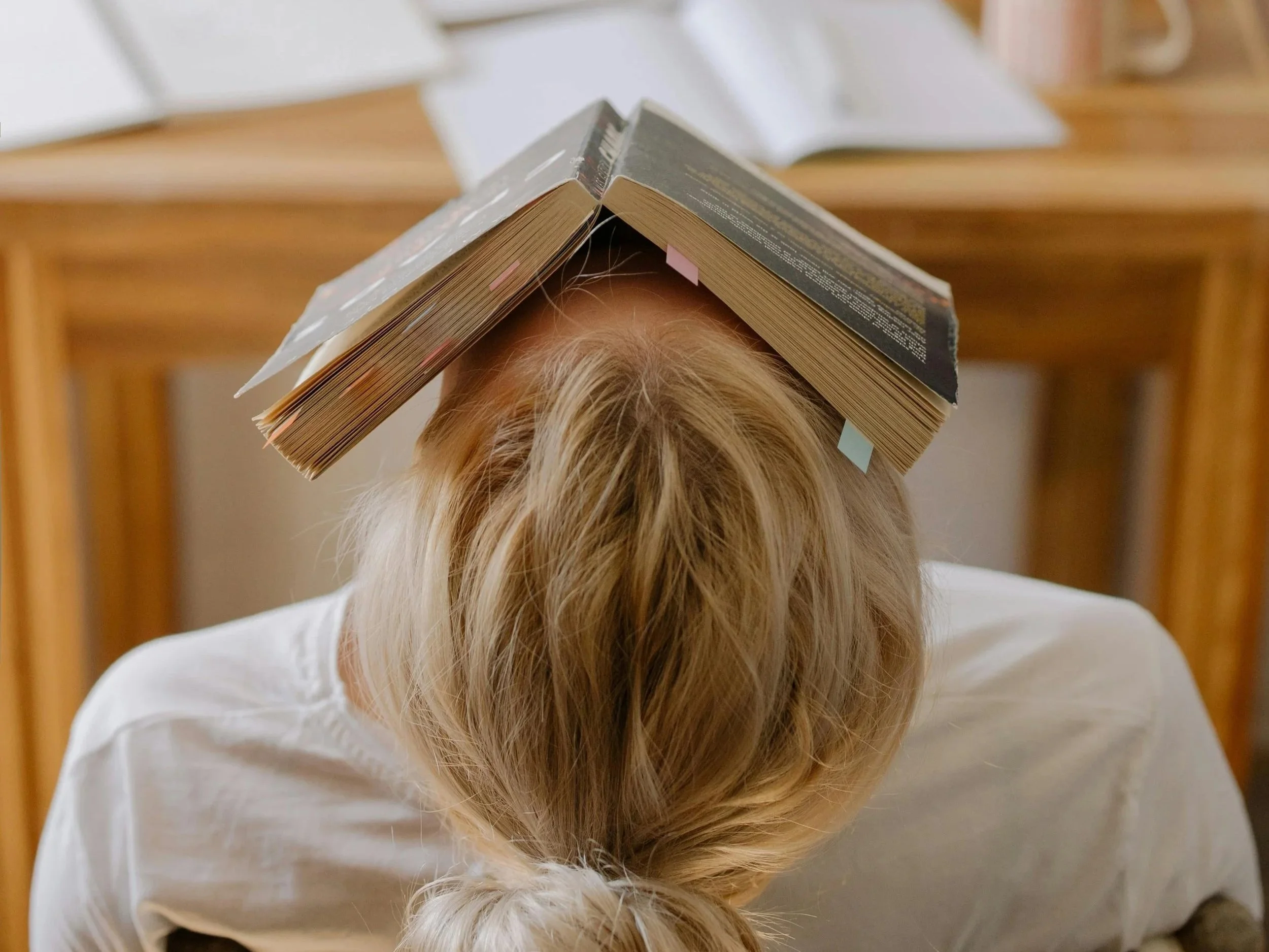 young woman collapses under the stress of burn out