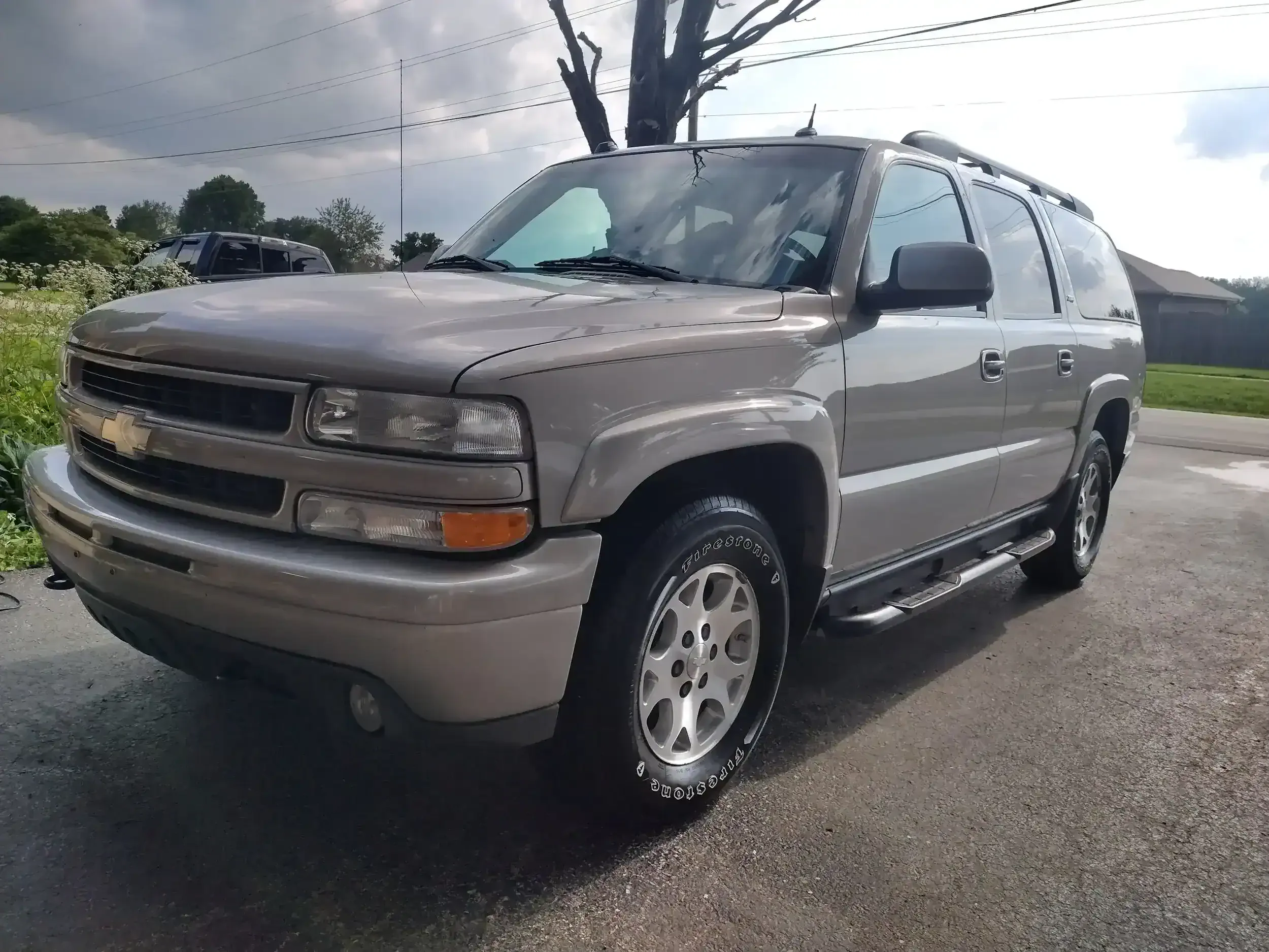 Signature Exterior Detail results on a freshly cleaned Chevrolet Suburban at Lamb Auto Detailing in Willard MO