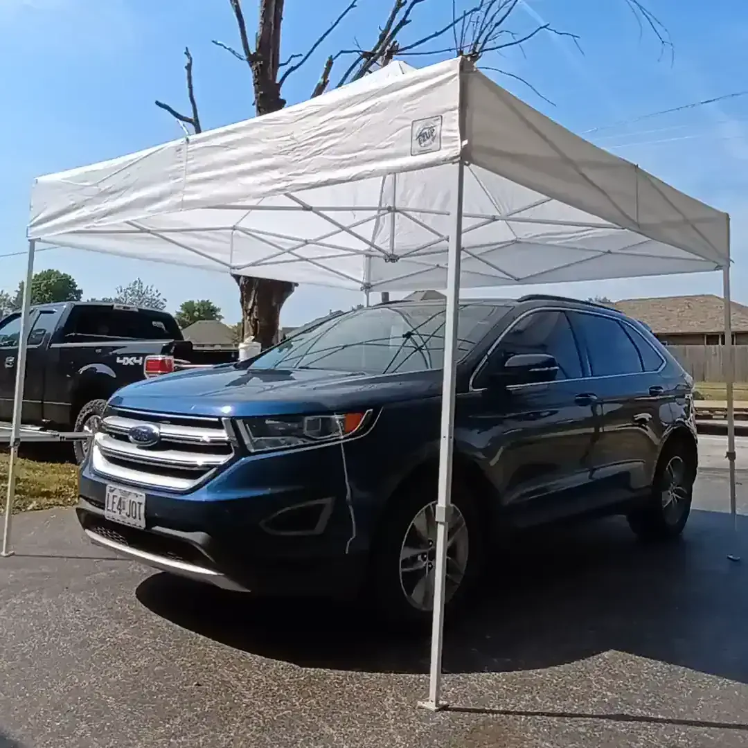 Mobile detailing results in Willard, MO showing a freshly detailed Ford Edge SUV parked under a canopy