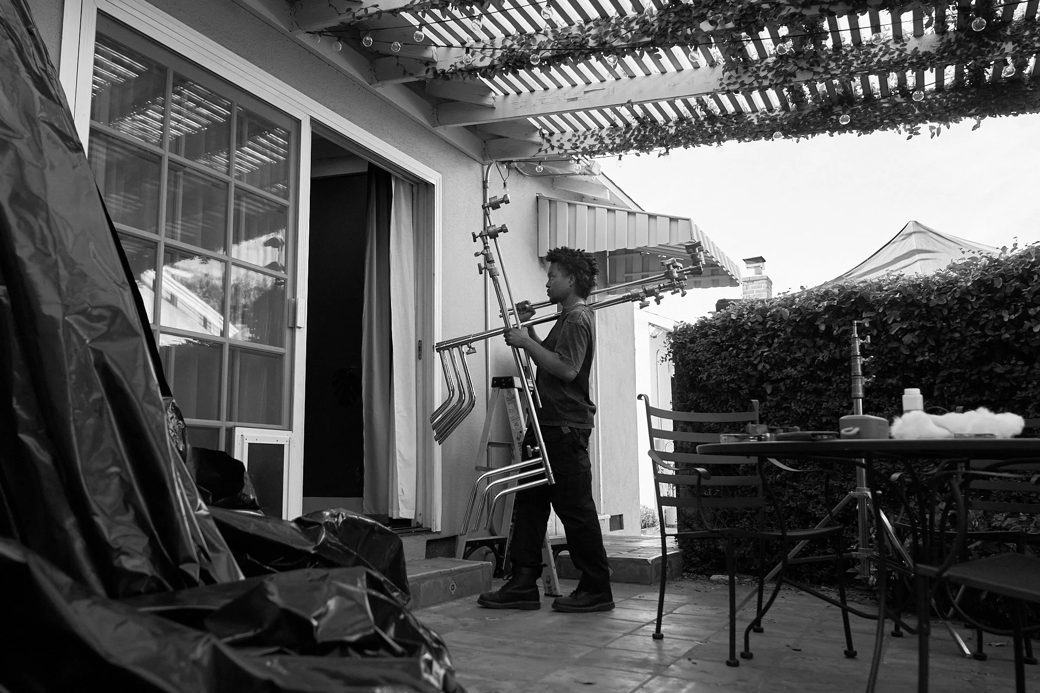 Unit stills photography, for the short film TEDDY, BTS image of crew loading in for the living room scene.