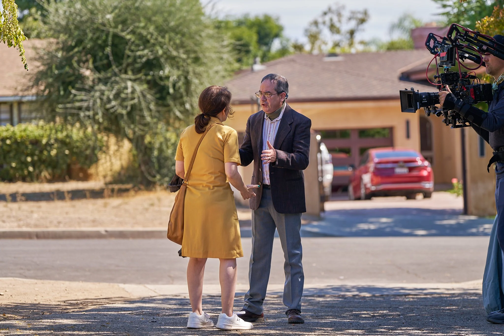 On-set unit stills photography, The Making of Jesus Diabetes, actors Andrew Friedman and Artemis Pebdani in the driveway.