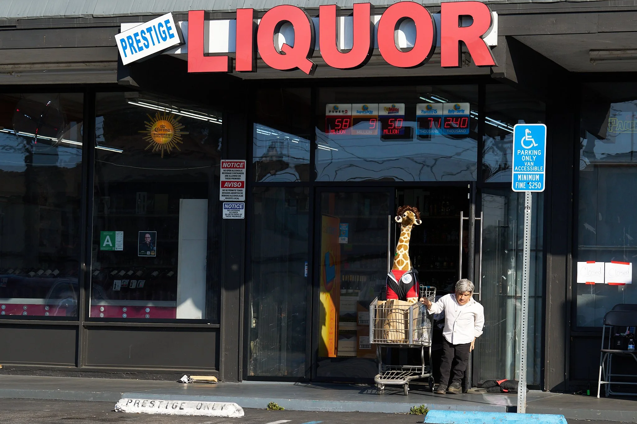 Unit stills photography, for the short film TEDDY, image of actor Mark Povinelli leaving the liquor store.