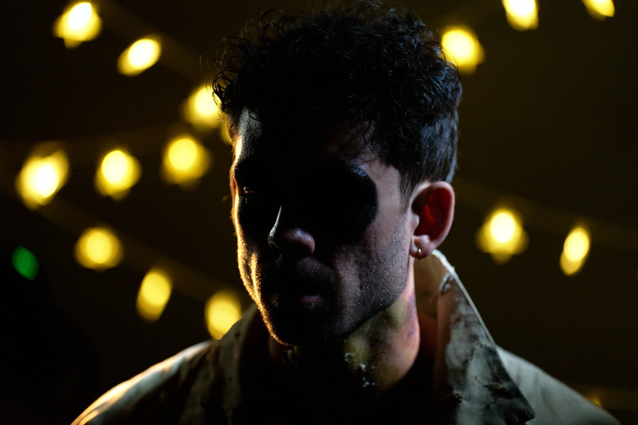 Unit stills photography, for the short film TEDDY, BTS image of actor Austin Minard sitting in for lighting test.