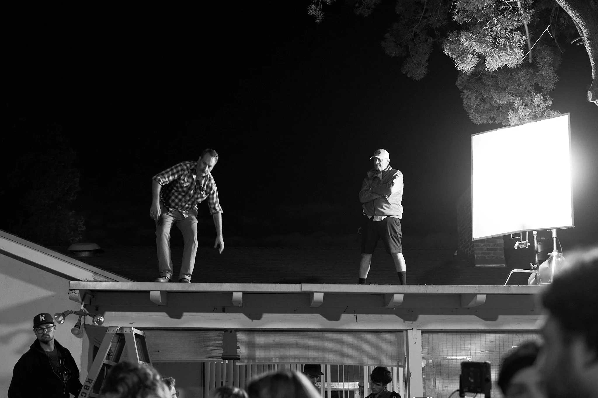 On-set unit stills photography, The Making of Jesus Diabetes, behind-the-scenes of crew adjusting the lighting.