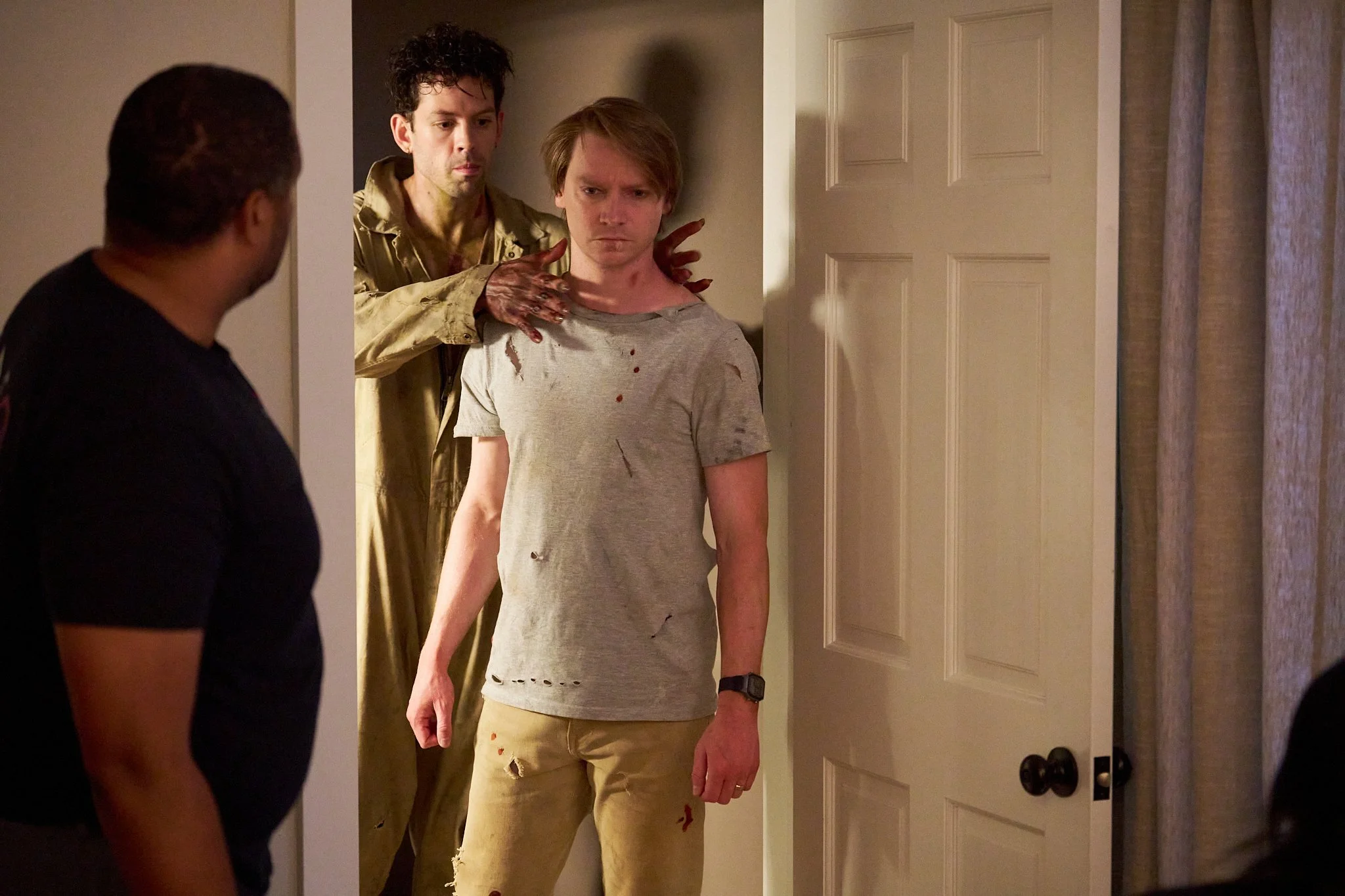 Unit stills photography, for the short film TEDDY, BTS image of actor Calum Worthy and Austin Minard rehearsing on set.