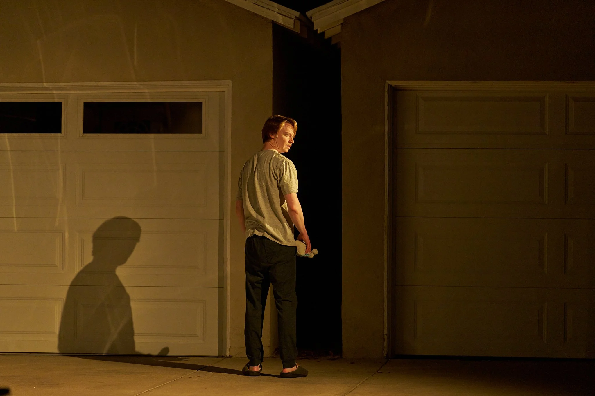 Unit stills photography, for the short film TEDDY, BTS image of actor Calum Worthy during the garage scene.
