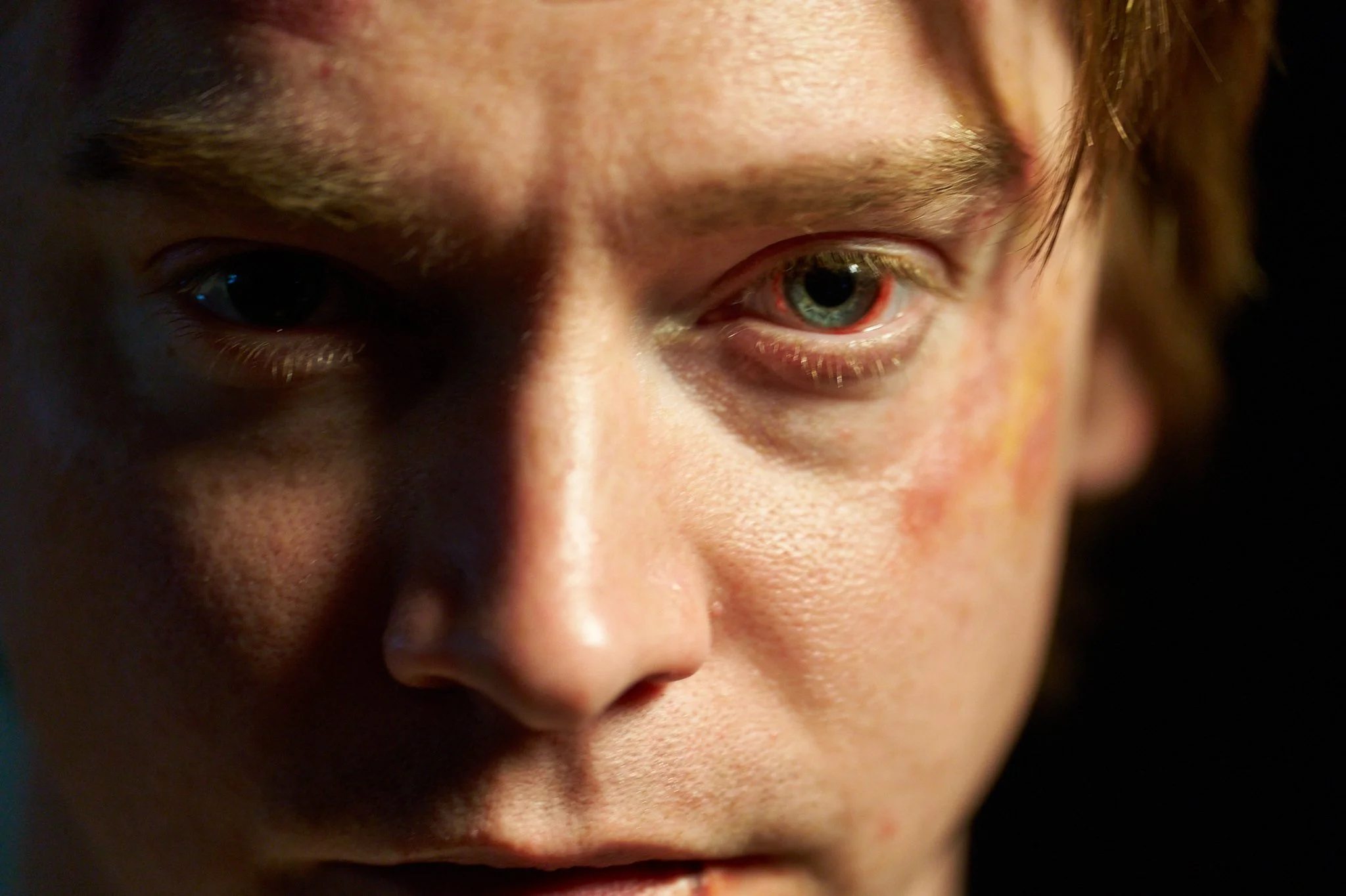 Unit stills photography, for the short film TEDDY, closeup image of actor Calum Worthy on set.