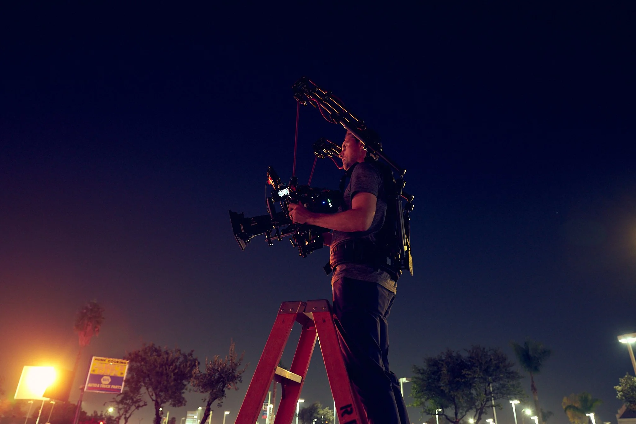 On-set unit stills photography, The Making of Jesus Diabetes, the director of photography getting the perfect angle.