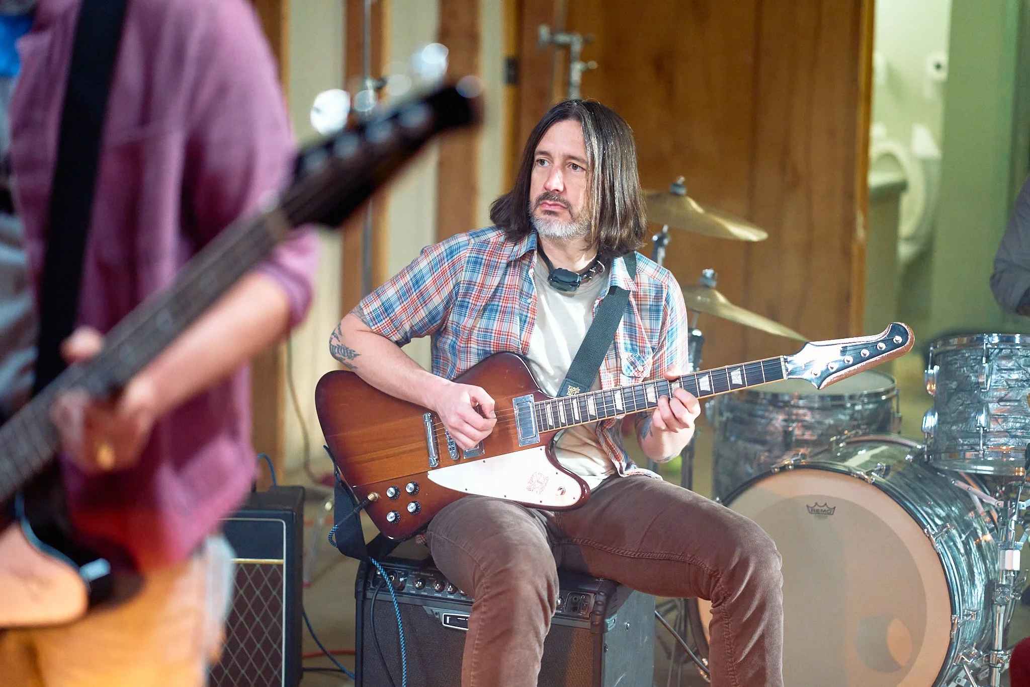 Unit stills photography, Super Fan vertical film, featuring The All-American Rejects. Guitarist Nick Wheeler in the garage scene.