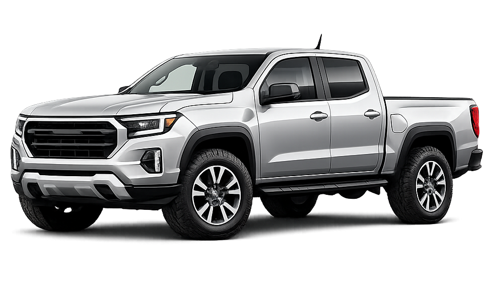 Silver pickup truck with black accents shown in a studio setting.