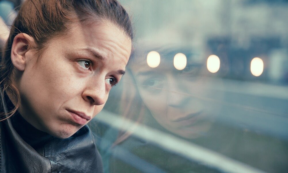 psilocybin for anxiety and depression woman looking out window