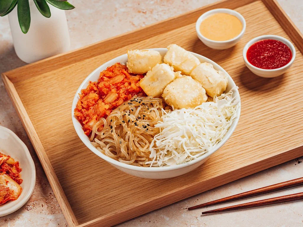 Doraji fried tofu dupbap with japchae, kimchi and cabbage