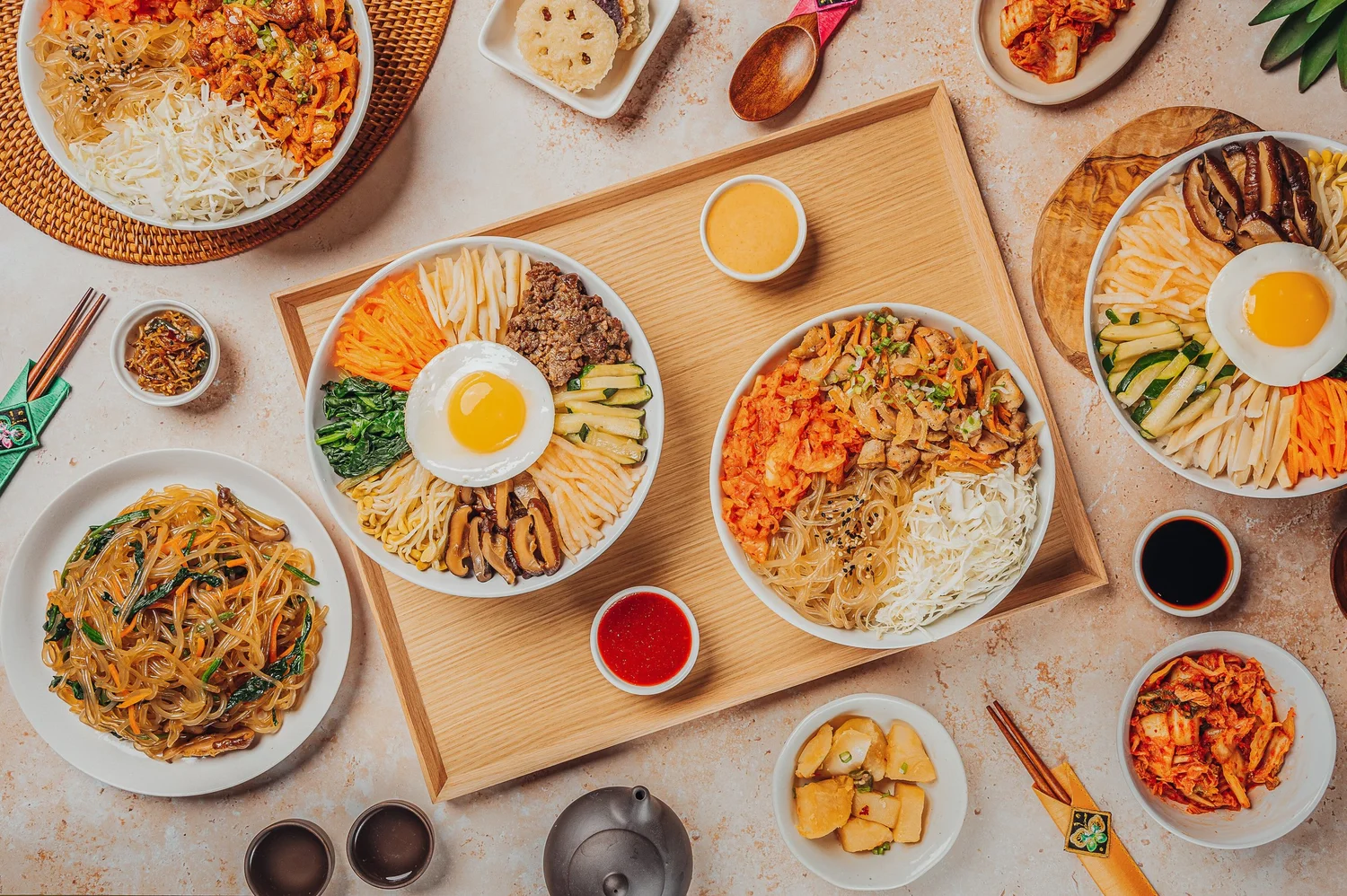 Doraji Korean catering spread with bibimbap, dupbap and japchae