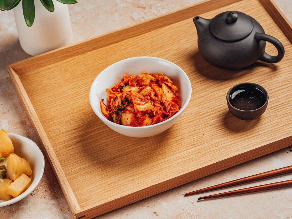 A bowl of Doraji house-made kimchi, which is made with fish sauce