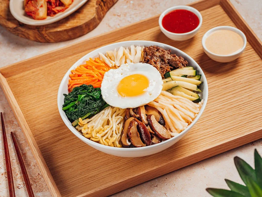 Doraji bulgogi beef bibimbap with seven vegetables and a fried egg