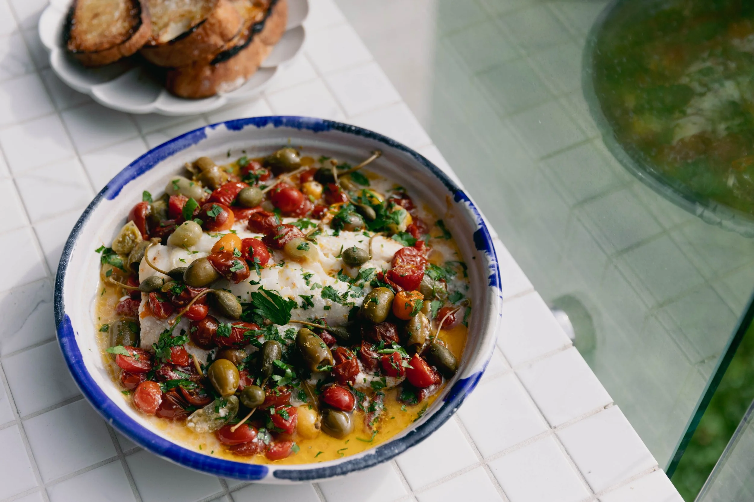 Roasted Ling with tomatoes and olives