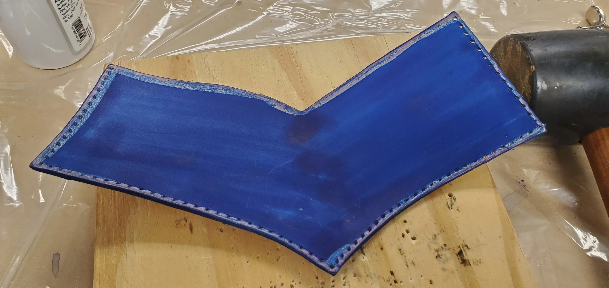 Punching holes for decorative stitching