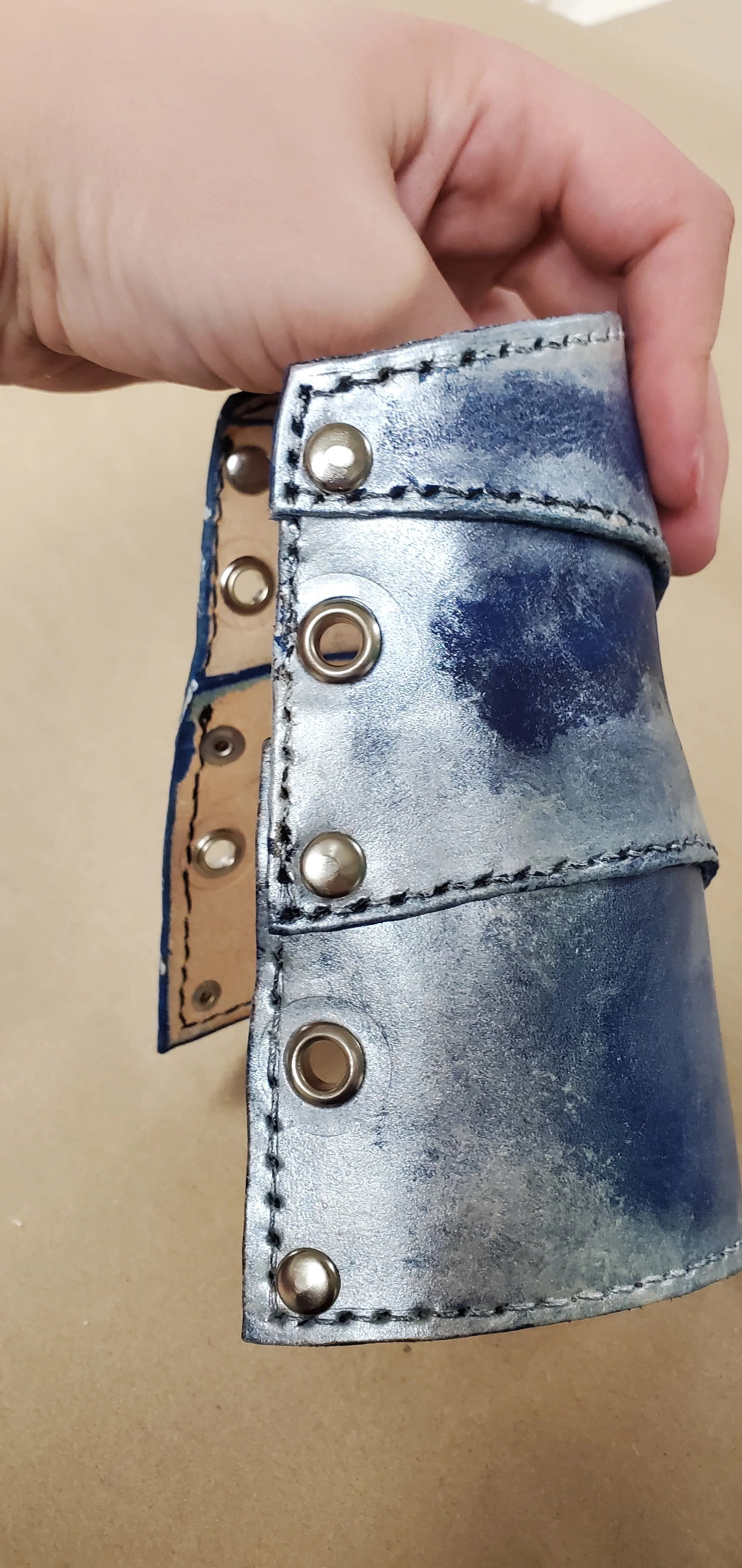 Adding grommets and elastic for closure