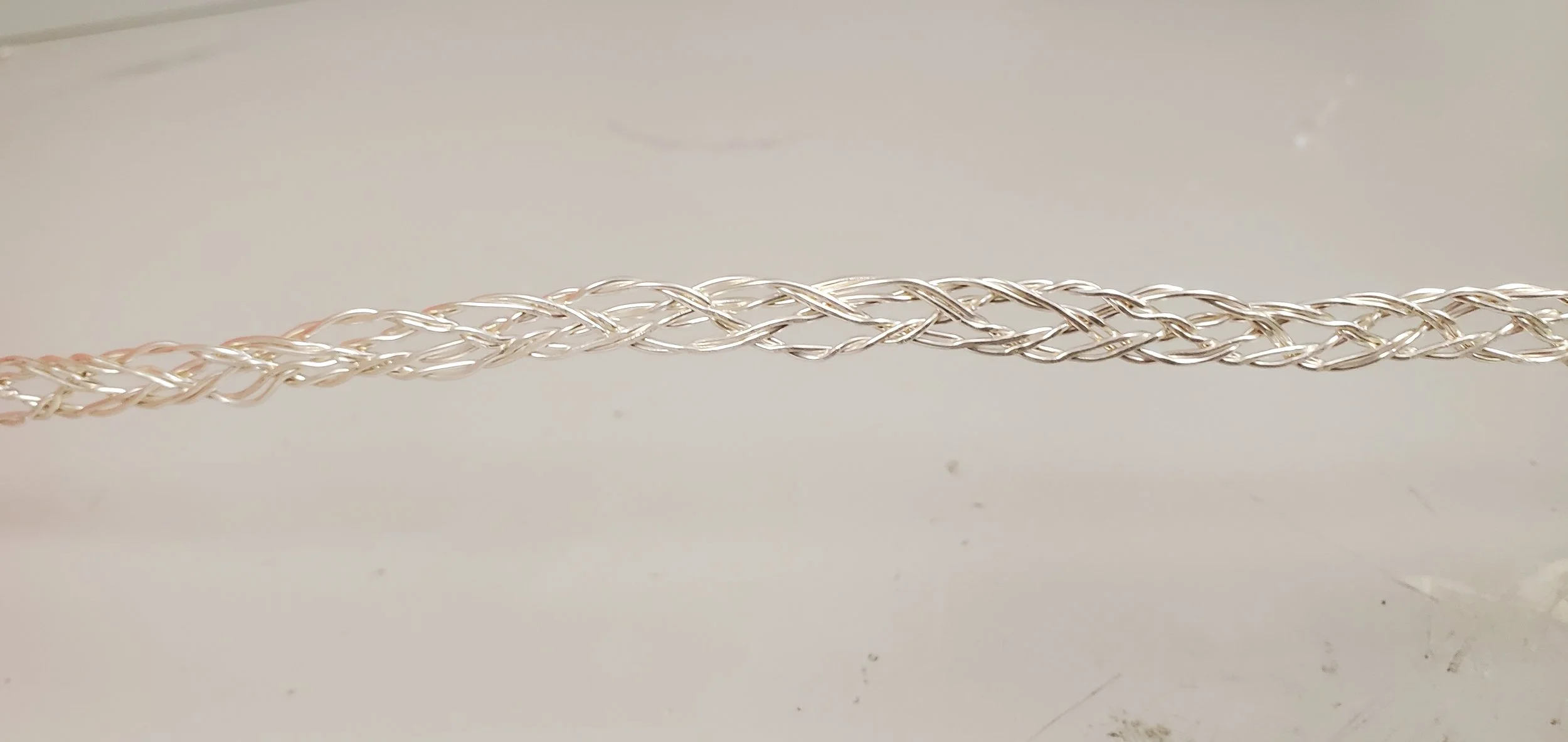 Wire after being flattened