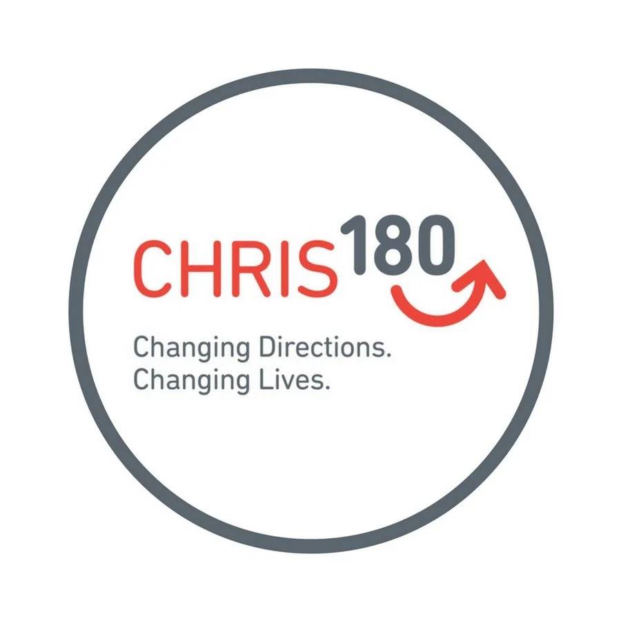 A circular logo with the name 'CHRIS 180' in red and black text. The '180' features an upward curved arrow, and the tagline reads 'Changing Directions. Changing Lives.'