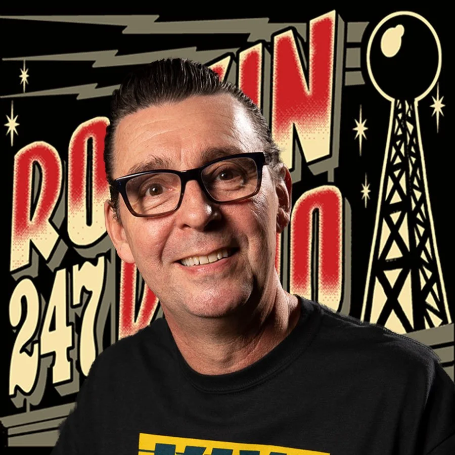 Tom with Logo.jpg