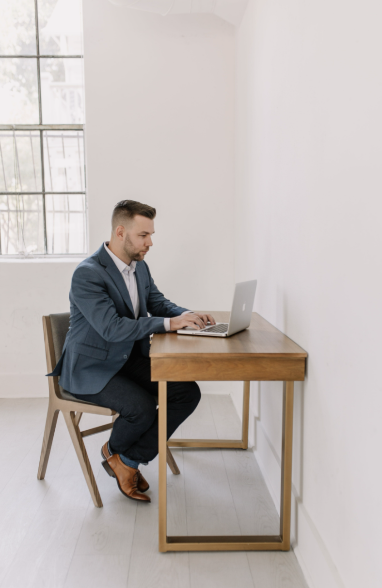 Greg Johnson working in office