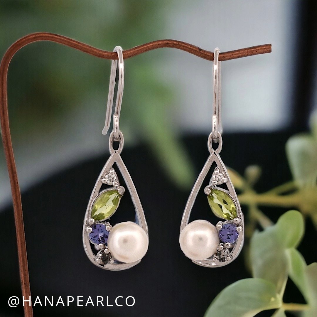 ✨ Just Launched ✨ Dive into the elegance of our newest creation &mdash; Sterling Silver Earrings with Freshwater Pearls and a vibrant mix of gems. The perfect blend of modern chic and timeless grace!

These earrings feature a beautifully crafted drop