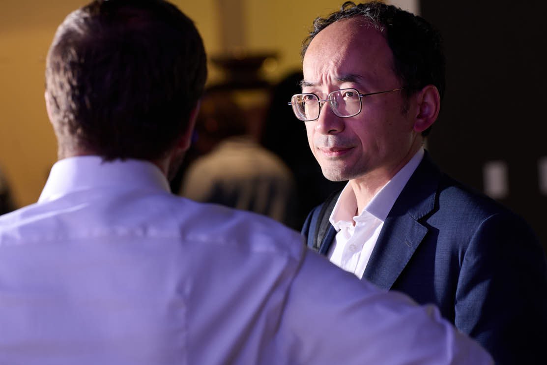 A man looking engaged at the Rosenblatt Securites Conference