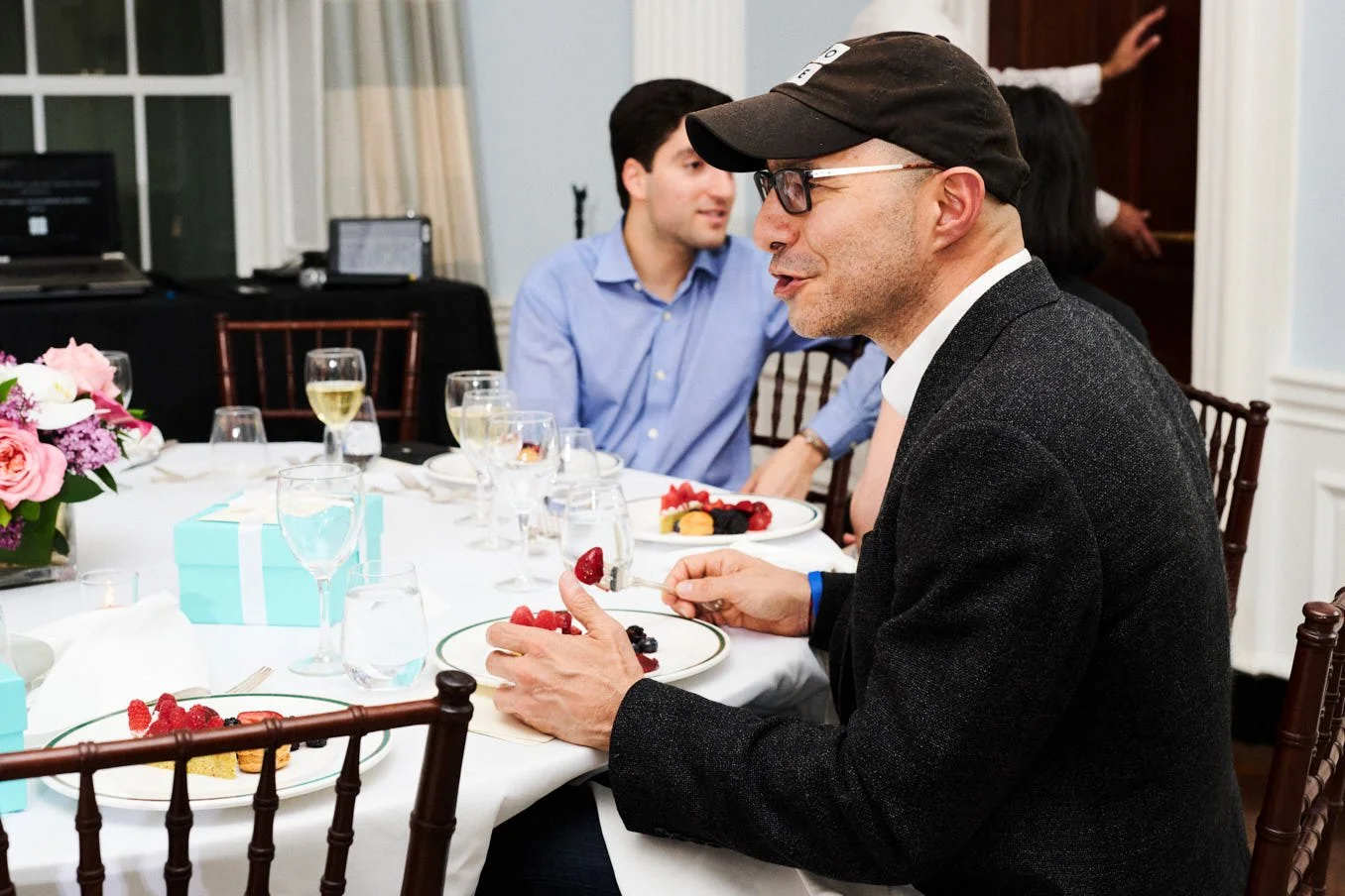 Hadi Partovi conversing at a fundraising dinner in New York, New York for code.org 