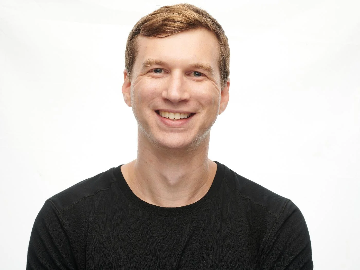 Professional Headshot of Ethan Feldman, Talos Cofounder