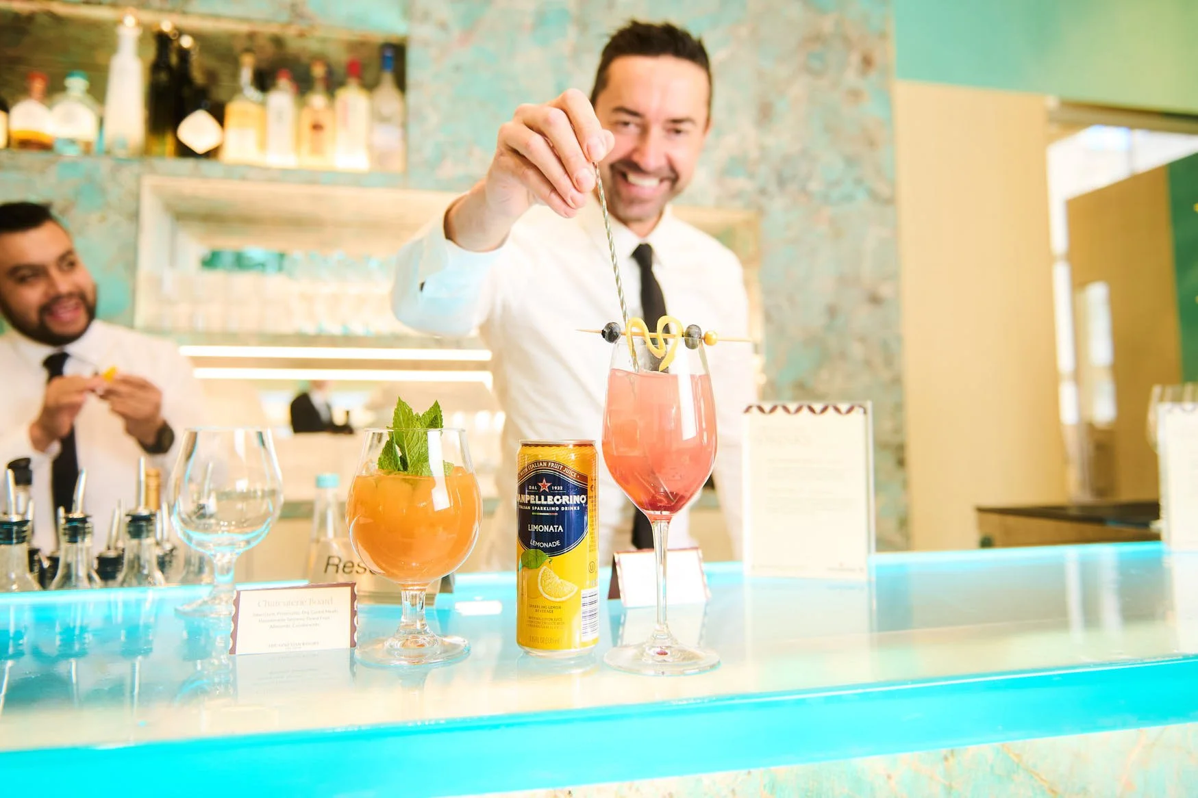 Bartender Mixing Drink with San Pellegrino Branding at Tiffany's for The Venetian 