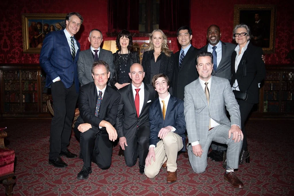 Professional Event Portrait of Jeff Bezos, Oxford University Delegates, and JRR Tolkien Descendants at the back of the JP Morgan Library 