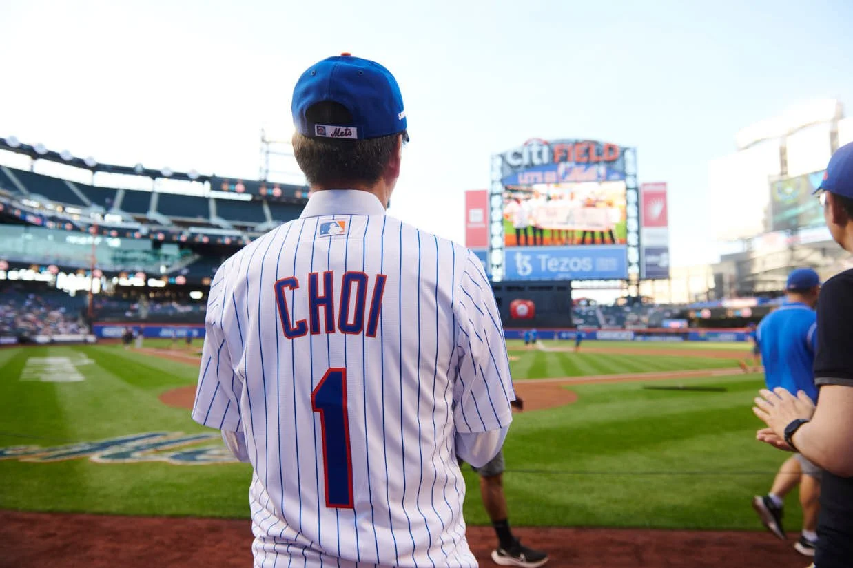Samsung executive KS Choi prior to throwing out the first pitch at citified 