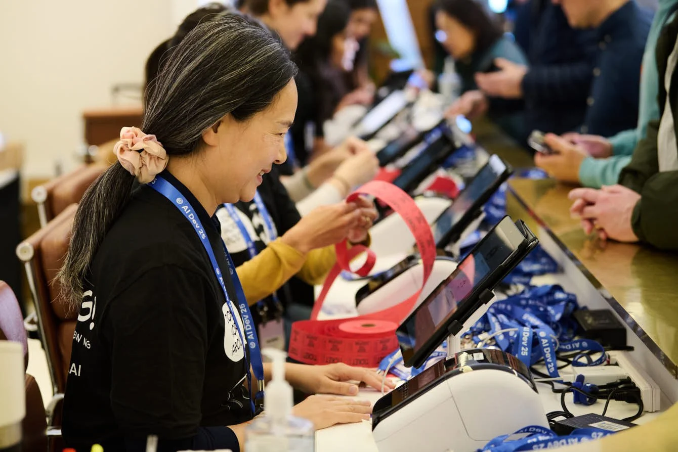 Conference staff at guest check-in