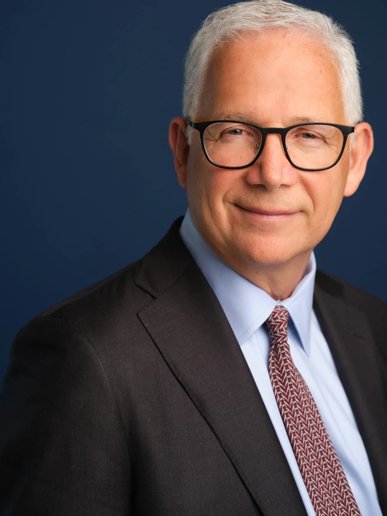 A professional, corporate headshot of US Attorney and Partner, David Sanford, for Sanford Heisler Sharp McKnight, taken at The Beekman, NYC