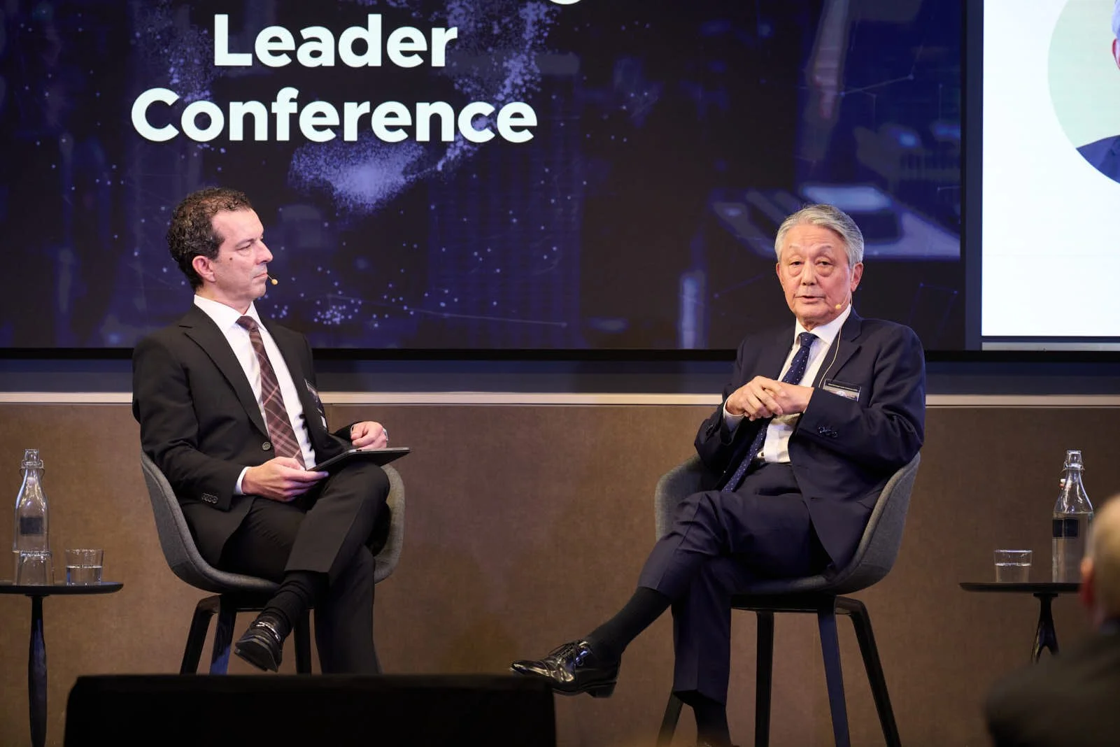 Hiromi Yamaji speaking onstage at the Global Exchange Leader Conference