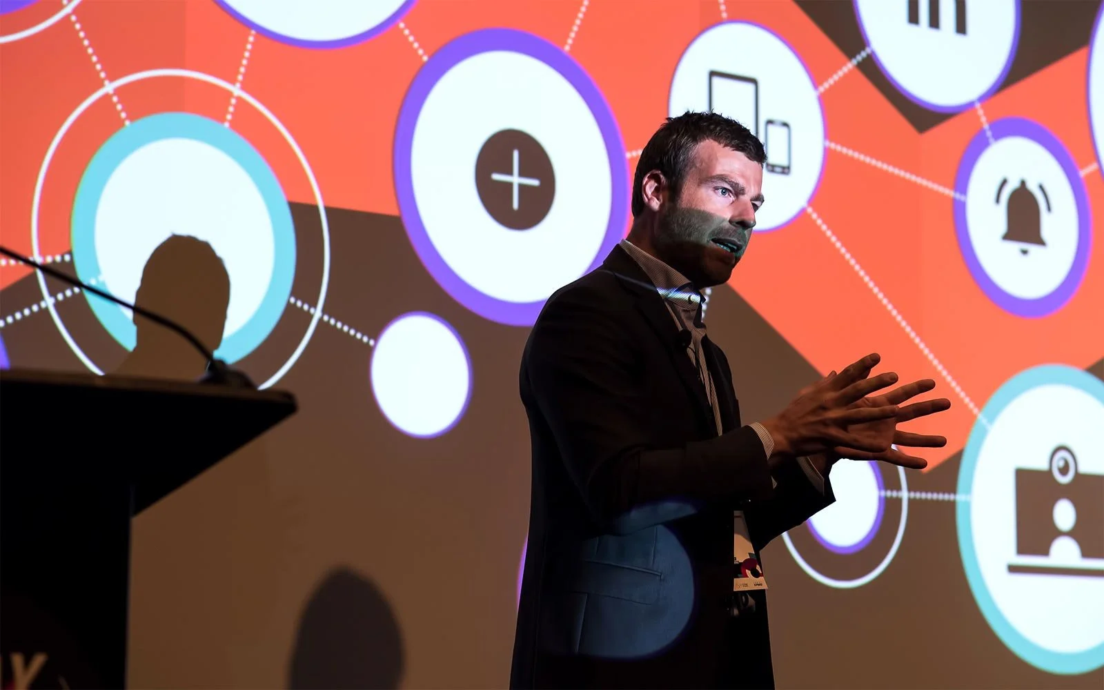 CEO onstage addressing crowd