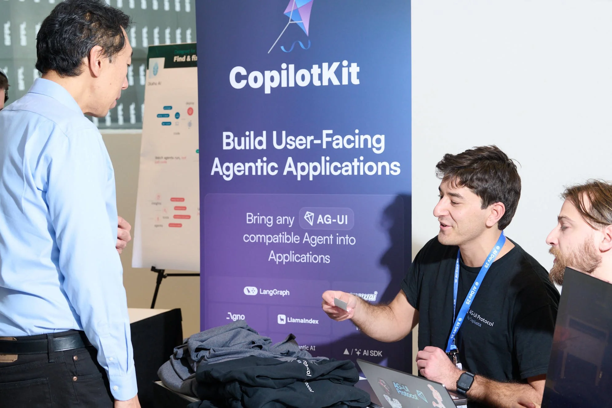Andrew Ng meeting a fan / exhibitor at Deeplearning.AI tech conference 