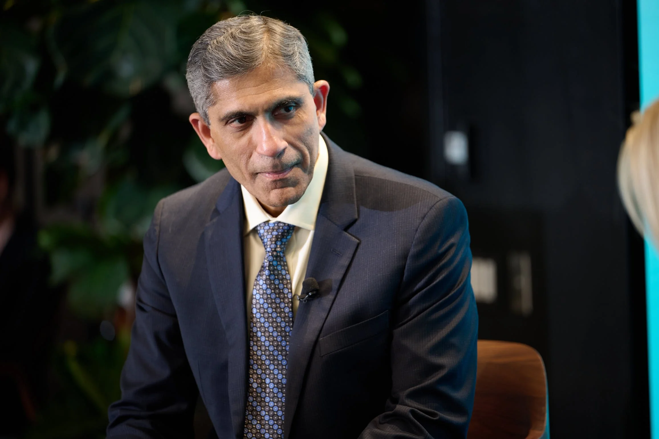 Honeywell CEO Vimal Kapur on stage at Nasdaq, for Quantinuum 