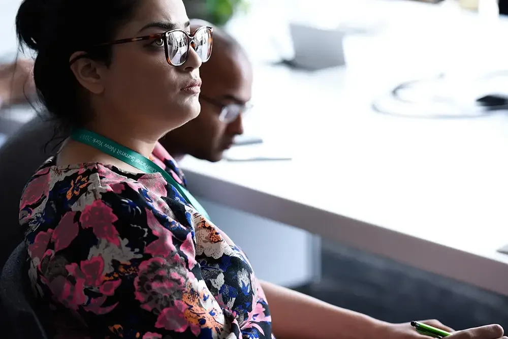 Woman in crowd at Google conference, NYC