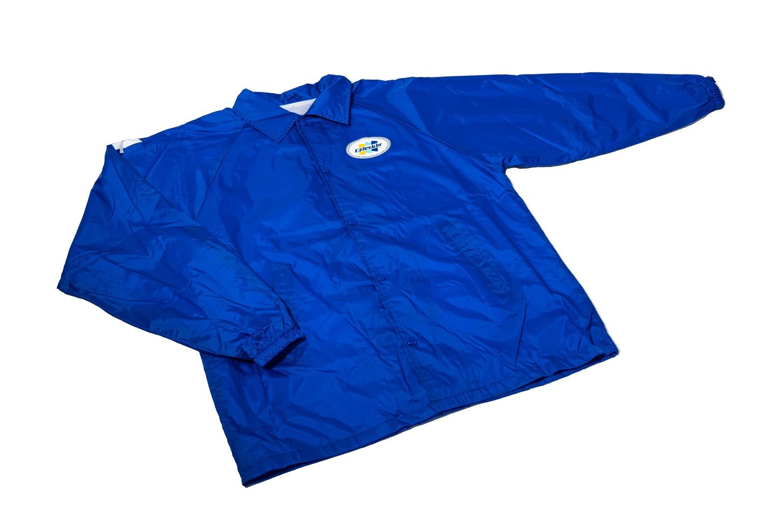 Racing-Team-Oval-Lightweight-Coaches-Jacket---Royal-Blue-1.webp