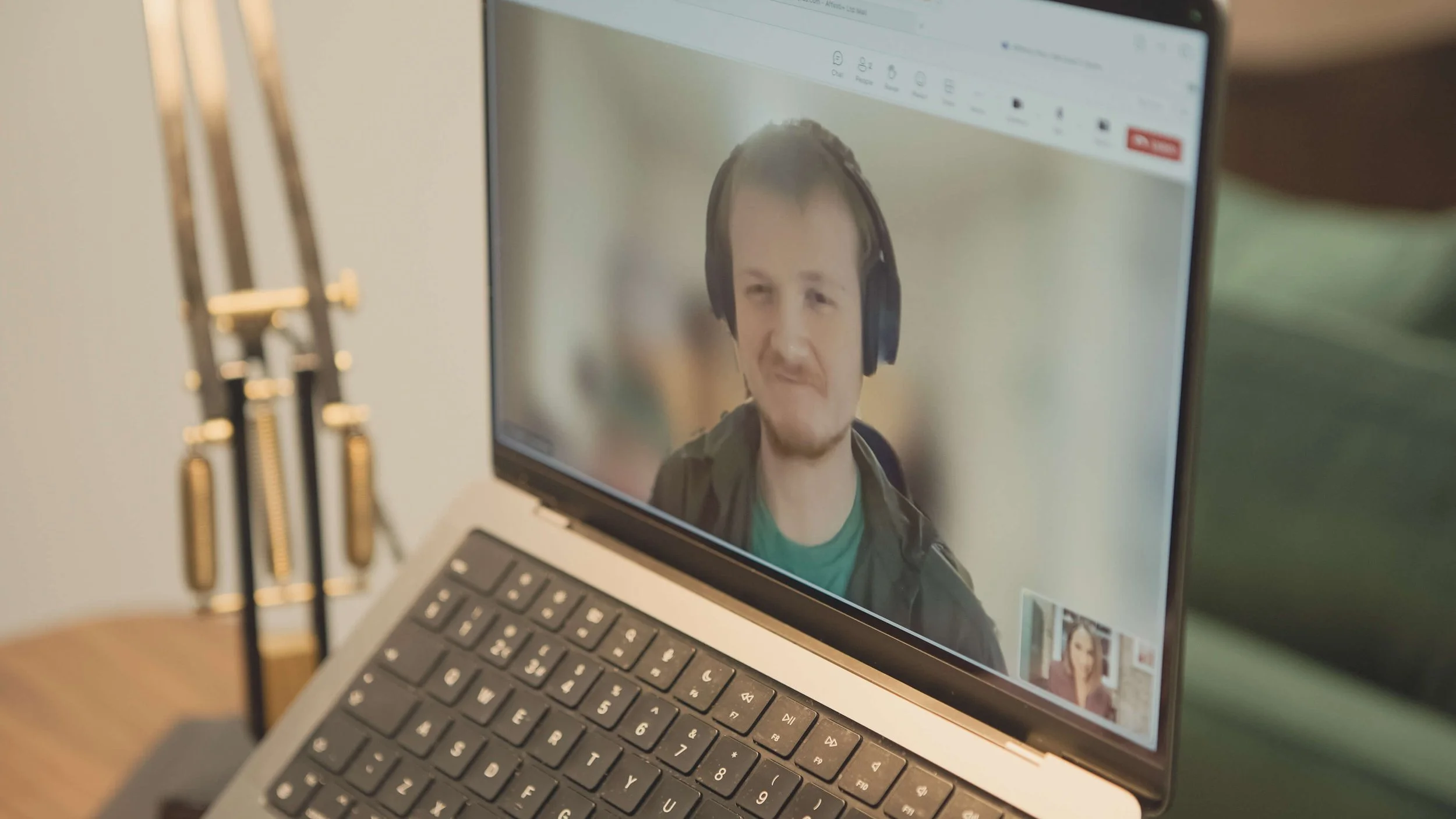 Video consultation shown on a laptop.