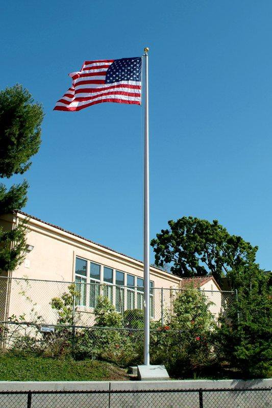 WE DONATED OUR TIME AND MATERIALS TO INSTALL A NEW FLAGPOLE AT JOLLA HIGH SCHOOL.