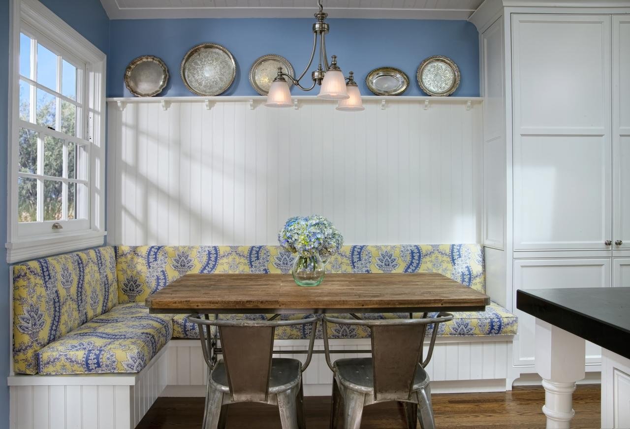 THE CUSTOM-MADE BREAKFAST NOOK WAS PART OF THE NEW ADDITION AND HAD TO BE DESIGNED INTO THE KITCHEN REMODEL.