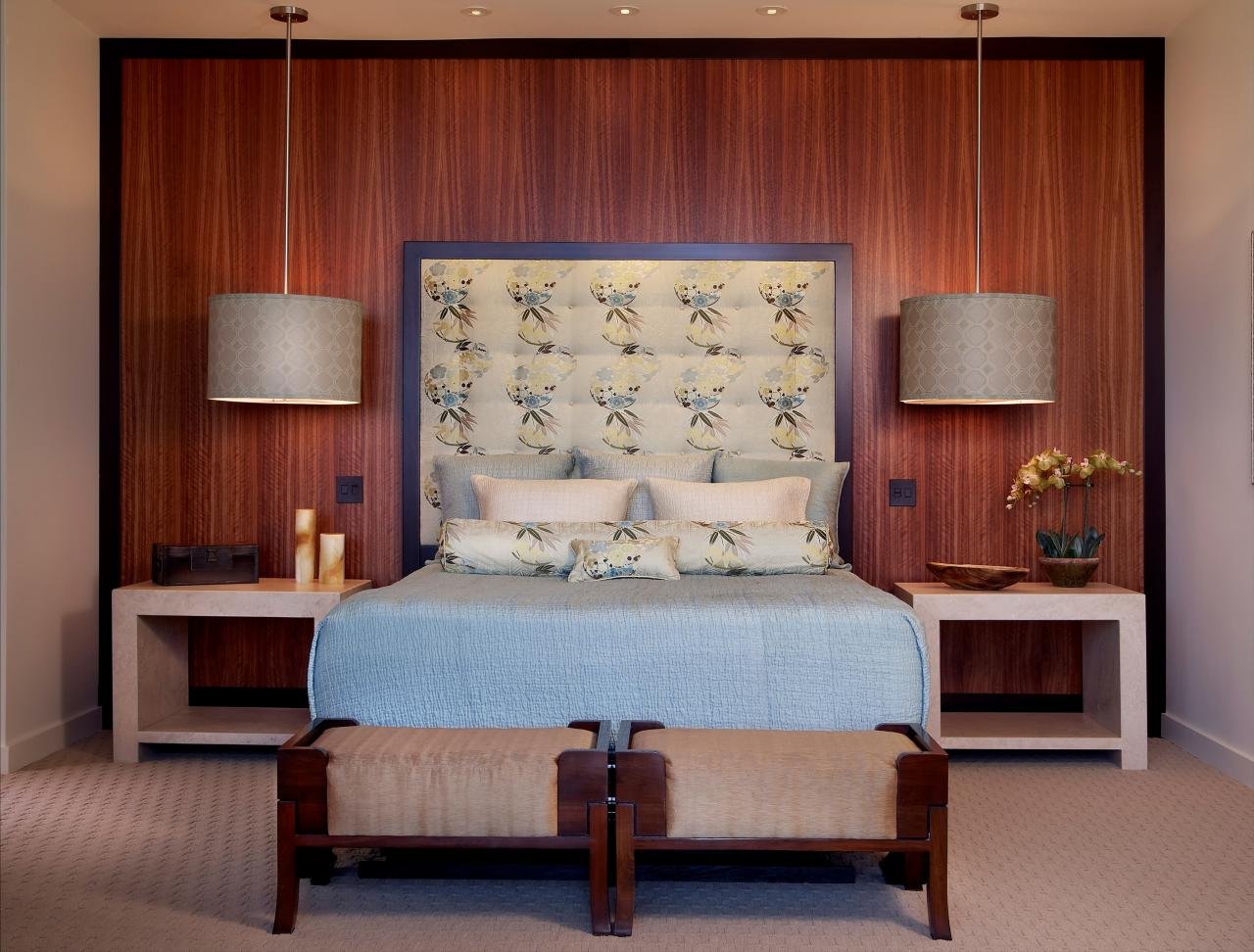 THE MASTER BEDROOM FEATURES A CUSTOM BED AND CONTINUES THE ASIAN MOTIF FOUND THROUGHOUT THE HOME.