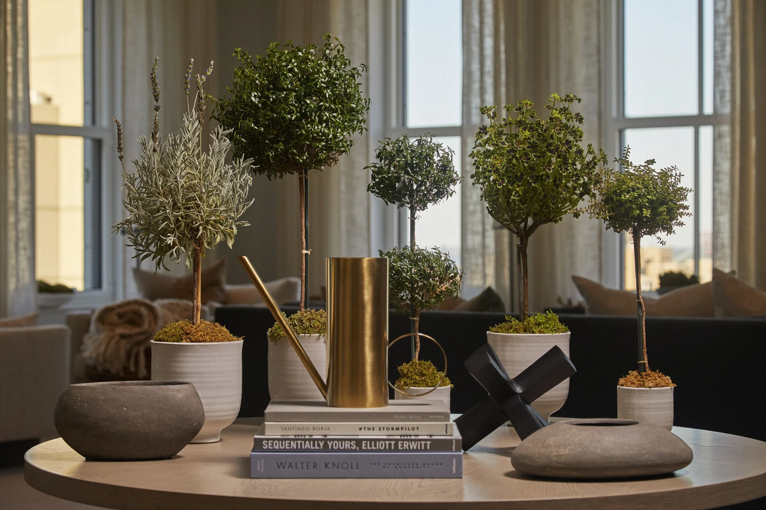 tabletop New York City floral design using tiny shrubs