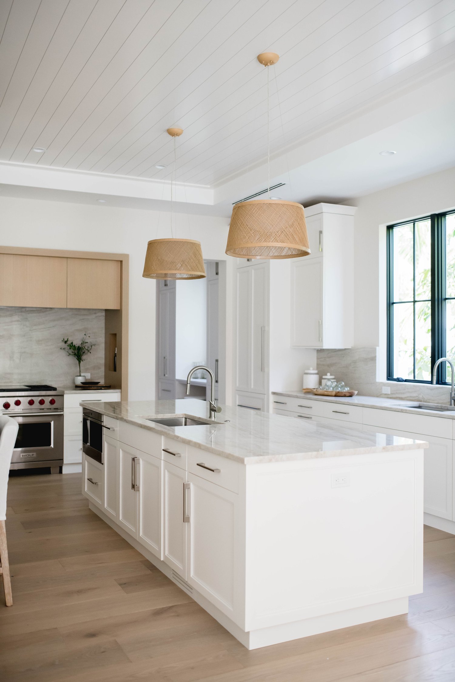 sharon-gilkey-montanna-interior-design-airy-naples-escape-kitchen-island.jpg