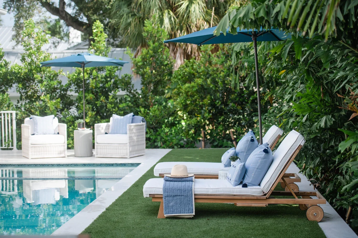 sharon-gilkey-montanna-interior-design-airy-naples-escape-pool-lounge.webp